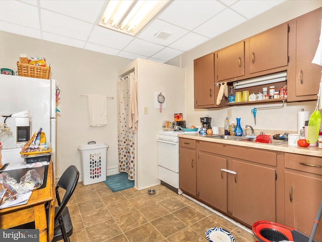 250 E E Main St, Waynesboro, PA 17268 - kitchen with a sink, a drop ceiling, white electric stove, light countertops, and open shelves