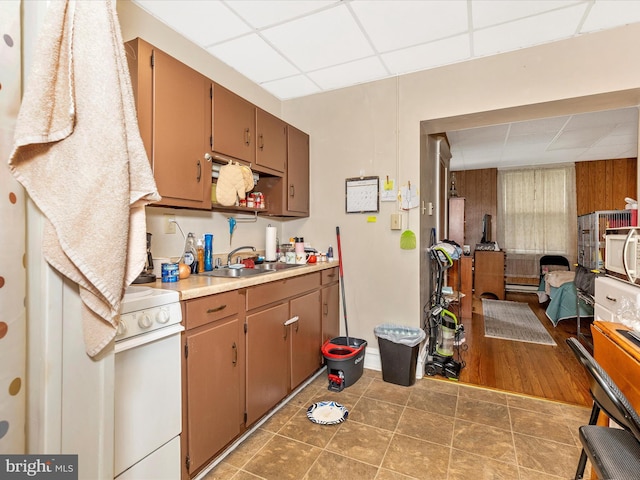 250 E E Main St, Waynesboro, PA 17268 - kitchen with a paneled ceiling, a sink, white appliances, light countertops, and open floor plan