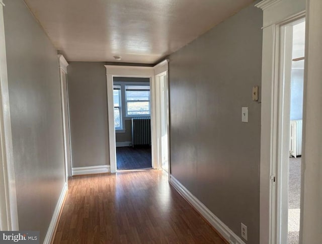 250 E E Main St, Waynesboro, PA 17268 - corridor featuring radiator, wood finished floors, and baseboards