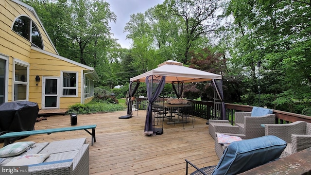 212 Haag Rd, Reading, PA 19606 - deck featuring a gazebo, outdoor dining area, area for grilling, and view of wooded area