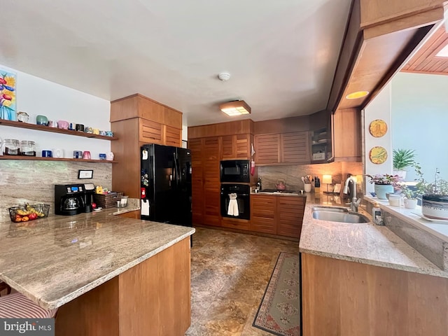 212 Haag Rd, Reading, PA 19606 - kitchen with a sink, black appliances, open shelves, backsplash, and a peninsula