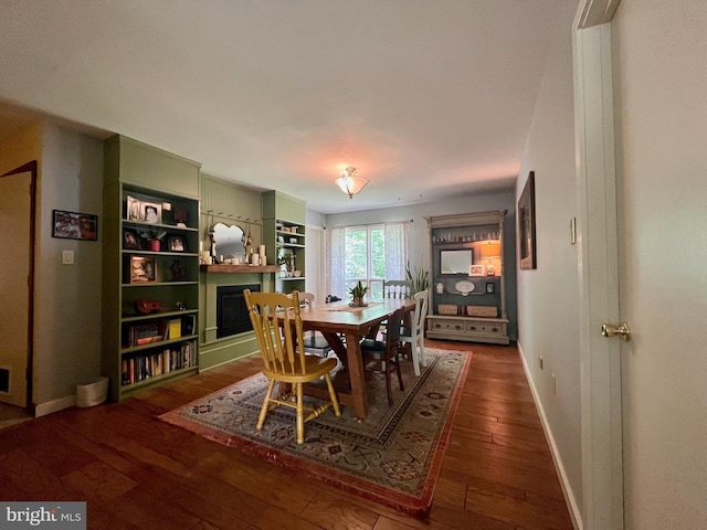 212 Haag Rd, Reading, PA 19606 - dining area featuring wood-type flooring, baseboards, and a fireplace