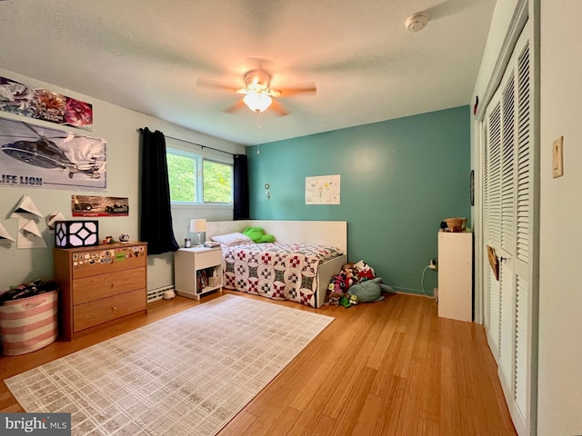 212 Haag Rd, Reading, PA 19606 - bedroom with wood finished floors, a closet, and a ceiling fan