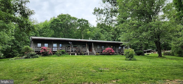 79 Mare Rd, Carlisle, PA 17015 - rear view of house with a yard and a porch