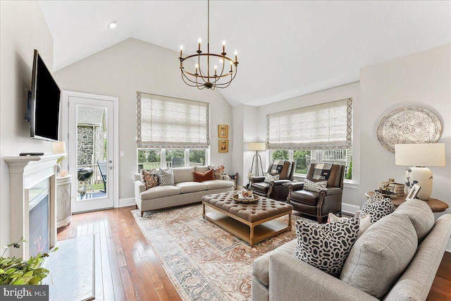 1009 James Walter Way, Kennett Square, PA 19348 - living area with plenty of natural light, a chandelier, high vaulted ceiling, wood-type flooring, and recessed lighting
