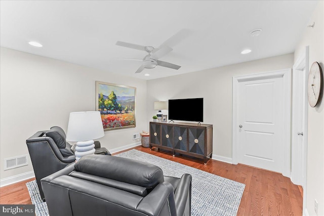 1009 James Walter Way, Kennett Square, PA 19348 - living room featuring wood finished floors, ceiling fan, baseboards, and recessed lighting