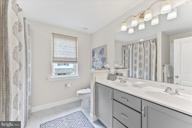 1009 James Walter Way, Kennett Square, PA 19348 - full bath with double vanity, baseboards, toilet, and curtained shower