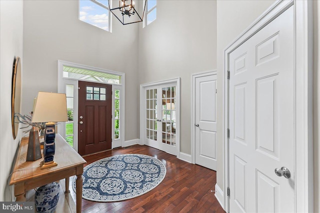 1009 James Walter Way, Kennett Square, PA 19348 - entrance foyer featuring a towering ceiling, wood finished floors, baseboards, plenty of natural light, and a chandelier