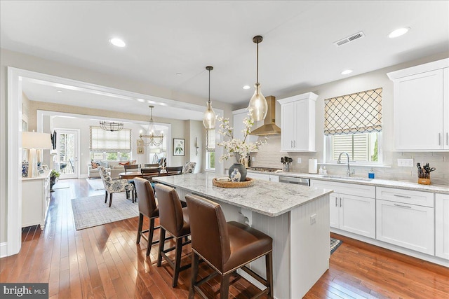 1009 James Walter Way, Kennett Square, PA 19348 - kitchen with a sink, a kitchen island, backsplash, white cabinetry, and recessed lighting