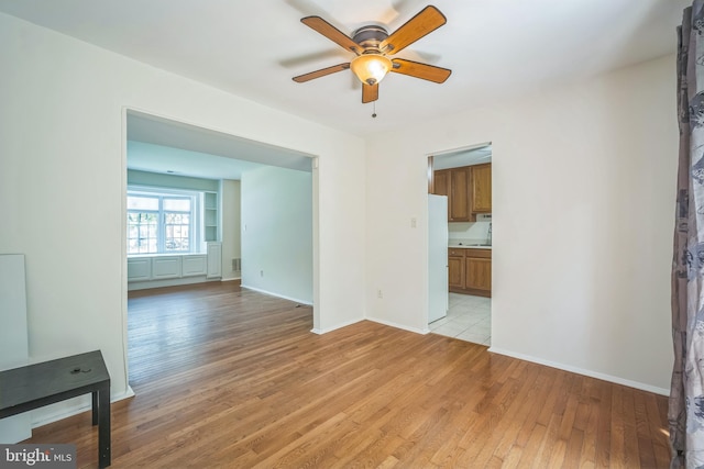 8361 Luce Ct, Springfield, VA 22153 - spare room featuring a ceiling fan and light wood finished floors