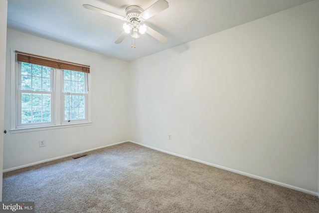 8361 Luce Ct, Springfield, VA 22153 - carpeted empty room with baseboards and ceiling fan
