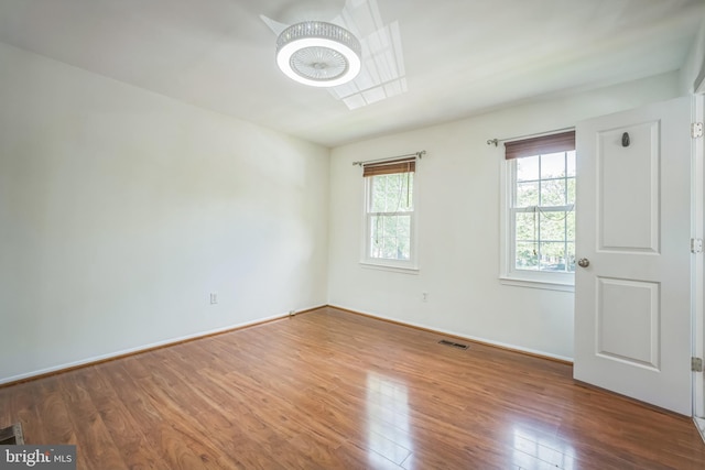 8361 Luce Ct, Springfield, VA 22153 - spare room with wood finished floors and baseboards