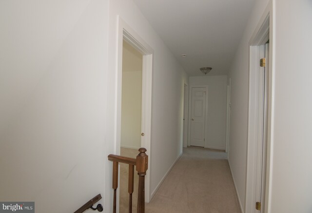 9 Paddington Ct, Hockessin, DE 19707 - corridor with light carpet, an upstairs landing, and baseboards