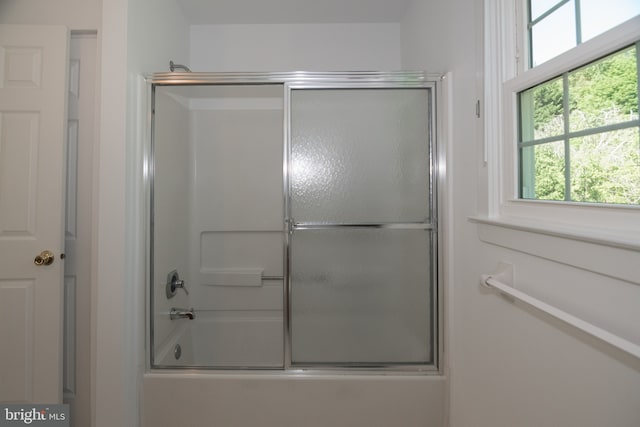 9 Paddington Ct, Hockessin, DE 19707 - bathroom featuring shower / bath combination with glass door and healthy amount of natural light