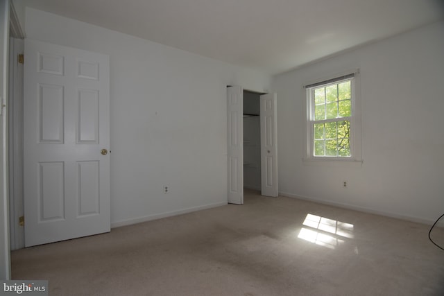 9 Paddington Ct, Hockessin, DE 19707 - unfurnished bedroom with carpet floors, baseboards, and a closet