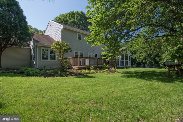 9 Paddington Ct, Hockessin, DE 19707 - view of green lawn featuring a deck and a sunroom
