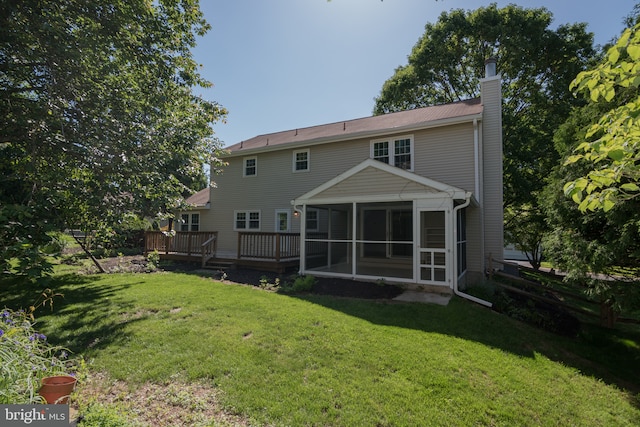 9 Paddington Ct, Hockessin, DE 19707 - back of property with a chimney, a sunroom, a yard, and a wooden deck