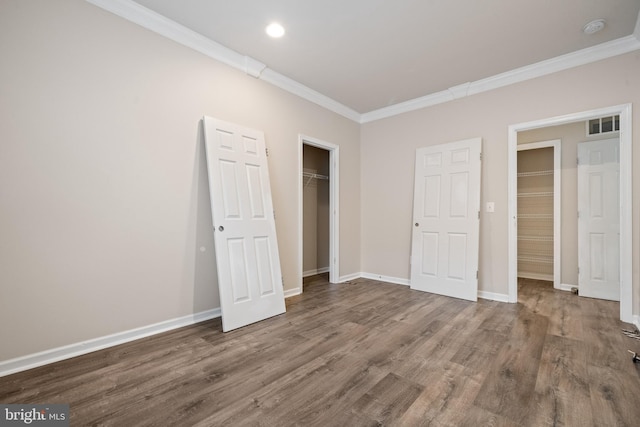 141 Patchwork Dr, Stephenson, VA 22656 - unfurnished bedroom featuring ornamental molding, wood finished floors, baseboards, a closet, and recessed lighting