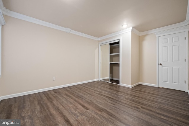 141 Patchwork Dr, Stephenson, VA 22656 - unfurnished bedroom with crown molding, dark wood-type flooring, a closet, baseboards, and recessed lighting
