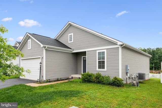 141 Patchwork Dr, Stephenson, VA 22656 - view of front facade with driveway, an attached garage, and cooling unit