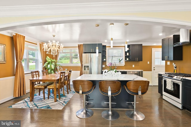 7434 Dickenson St, Springfield, VA 22150 - kitchen featuring stainless steel appliances, wall chimney range hood, open shelves, a chandelier, and a kitchen island