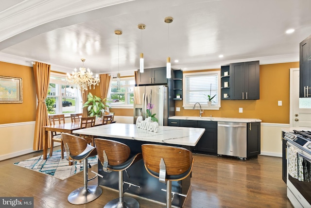7434 Dickenson St, Springfield, VA 22150 - kitchen with appliances with stainless steel finishes, a sink, open shelves, crown molding, and a chandelier