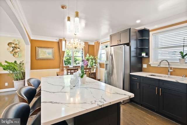 7434 Dickenson St, Springfield, VA 22150 - kitchen with a sink, a chandelier, a center island, dark wood-type flooring, and crown molding