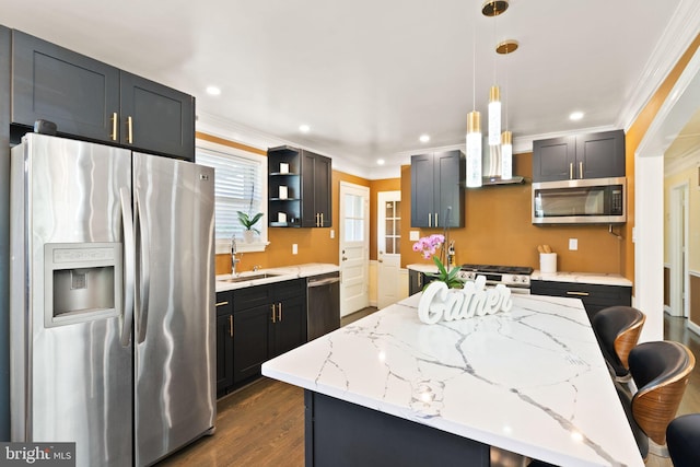 7434 Dickenson St, Springfield, VA 22150 - kitchen featuring stainless steel appliances, a sink, crown molding, open shelves, and a center island