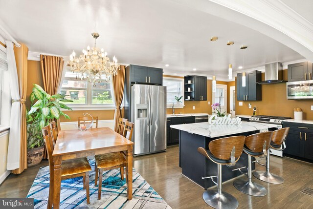 7434 Dickenson St, Springfield, VA 22150 - kitchen featuring stainless steel appliances, wall chimney exhaust hood, open shelves, a sink, and crown molding