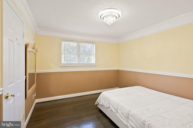 7434 Dickenson St, Springfield, VA 22150 - bedroom featuring crown molding, wood finished floors, baseboards, and a chandelier