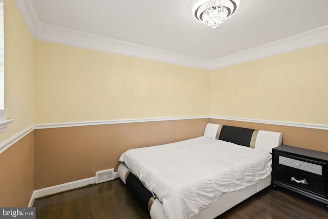 7434 Dickenson St, Springfield, VA 22150 - bedroom featuring crown molding, wood finished floors, a chandelier, and baseboards