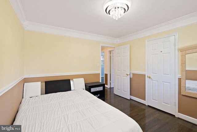 7434 Dickenson St, Springfield, VA 22150 - bedroom with crown molding, dark wood-style flooring, baseboards, and a chandelier