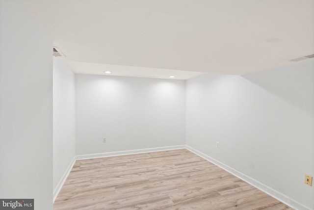 7434 Dickenson St, Springfield, VA 22150 - finished basement featuring light wood-type flooring, recessed lighting, and baseboards