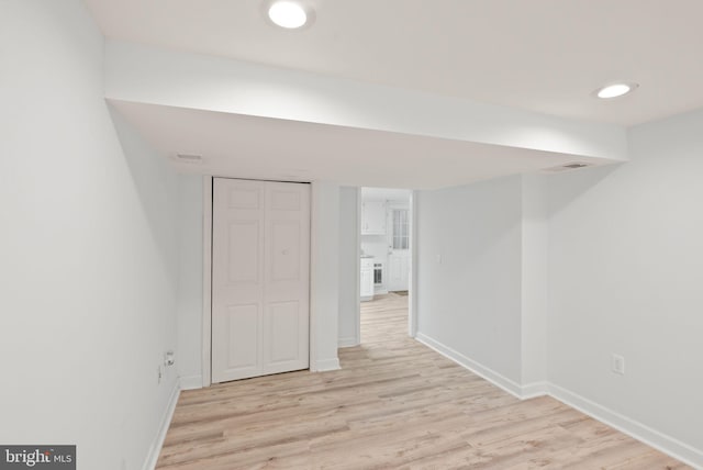 7434 Dickenson St, Springfield, VA 22150 - finished below grade area with baseboards and light wood-type flooring