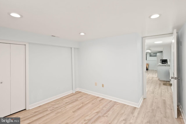7434 Dickenson St, Springfield, VA 22150 - unfurnished bedroom with light wood-type flooring, baseboards, and recessed lighting