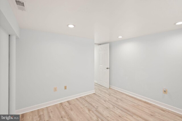 7434 Dickenson St, Springfield, VA 22150 - empty room featuring light wood-style floors, recessed lighting, and baseboards