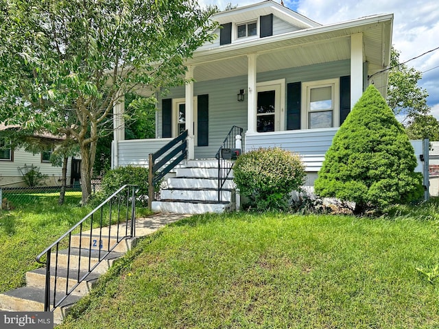 128 Grant Ave, West Collingswood Heights, NJ 08059 - bungalow-style home featuring covered porch, a front yard, and stairs