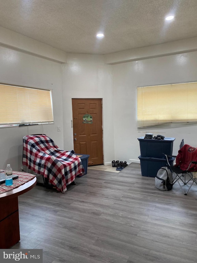 2600 S Mildred St, Philadelphia, PA 19148 - living area featuring wood finished floors, recessed lighting, a textured ceiling, and baseboards