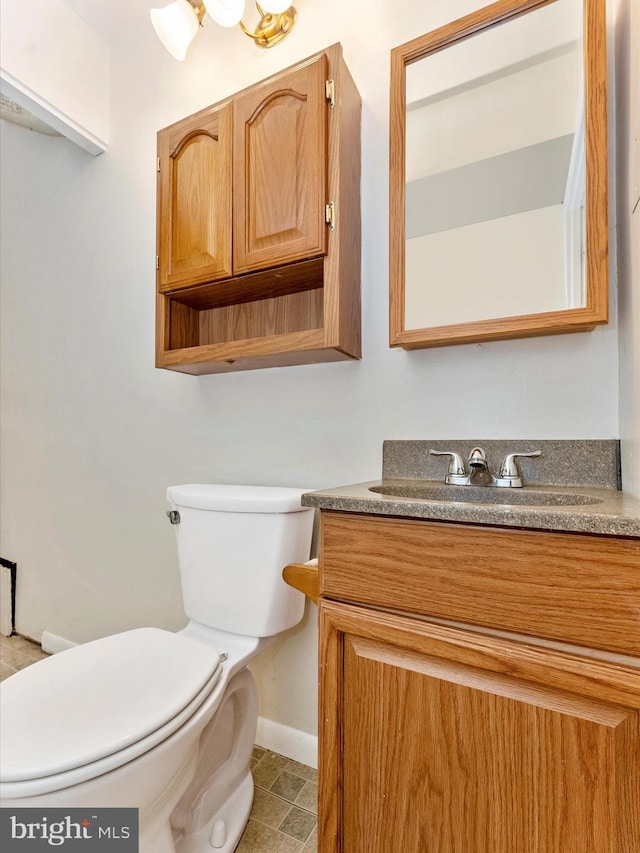 7324 E Springbrook Ct, Middletown, MD 21769 - half bath with toilet, vanity, and baseboards