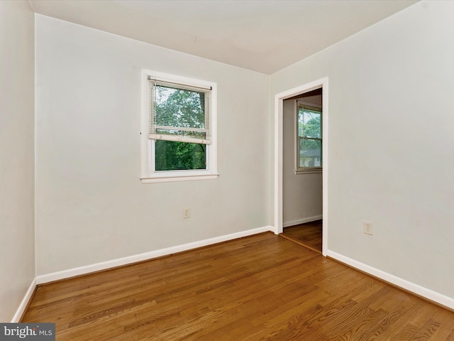 7324 E Springbrook Ct, Middletown, MD 21769 - unfurnished room with wood finished floors and baseboards