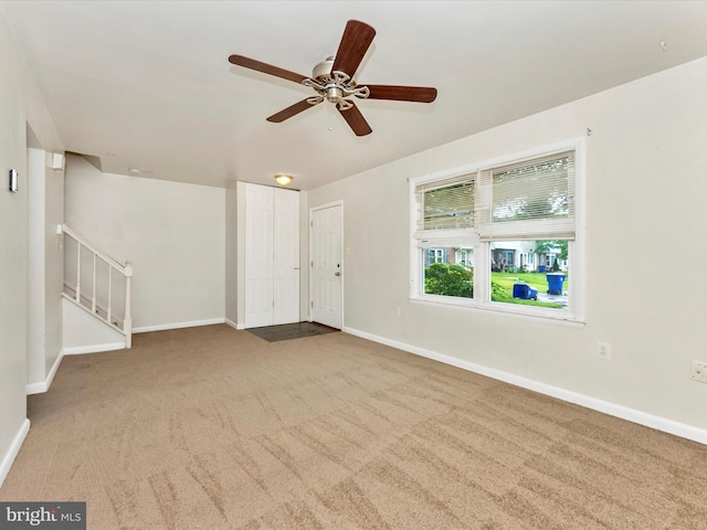 7324 E Springbrook Ct, Middletown, MD 21769 - entryway with carpet floors, stairway, baseboards, and ceiling fan