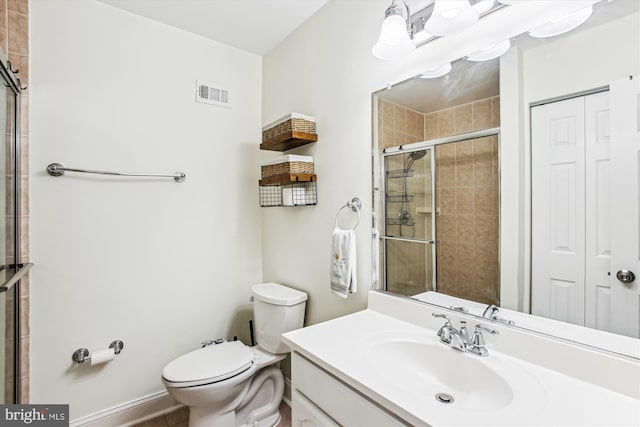 11910 Saint Johnsbury Ct, Reston, VA 20191 - bathroom with toilet, a tile shower, vanity, and a closet
