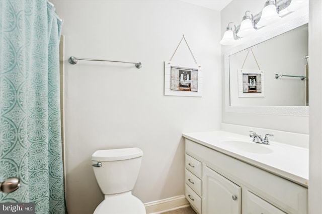11910 Saint Johnsbury Ct, Reston, VA 20191 - full bathroom with vanity, baseboards, toilet, and curtained shower