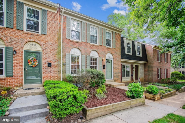 11910 Saint Johnsbury Ct, Reston, VA 20191 - view of property featuring brick siding