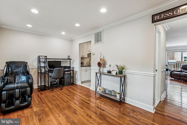 11910 Saint Johnsbury Ct, Reston, VA 20191 - office with wood finished floors, crown molding, recessed lighting, and baseboards