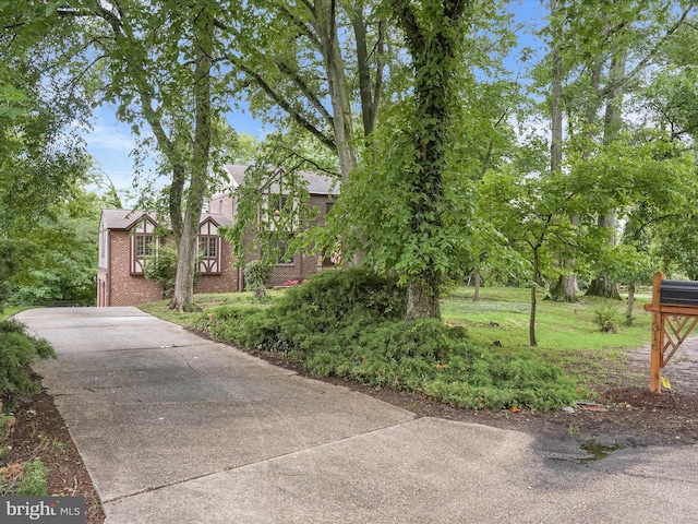 1316 Swan Harbour Rd, Fort Washington, MD 20744 - view of front facade featuring brick siding and concrete driveway