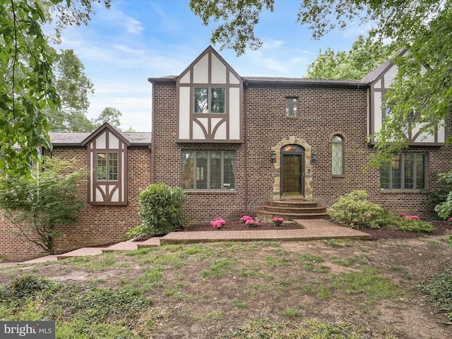 1316 Swan Harbour Rd, Fort Washington, MD 20744 - tudor house featuring brick siding and stucco siding