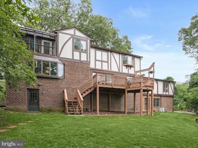 1316 Swan Harbour Rd, Fort Washington, MD 20744 - rear view of house featuring stucco siding, brick siding, stairway, a yard, and a deck