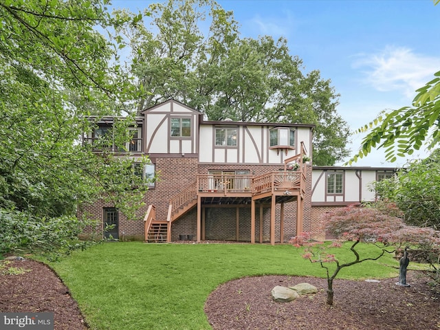 1316 Swan Harbour Rd, Fort Washington, MD 20744 - rear view of house with brick siding, a wooden deck, a yard, stucco siding, and stairway
