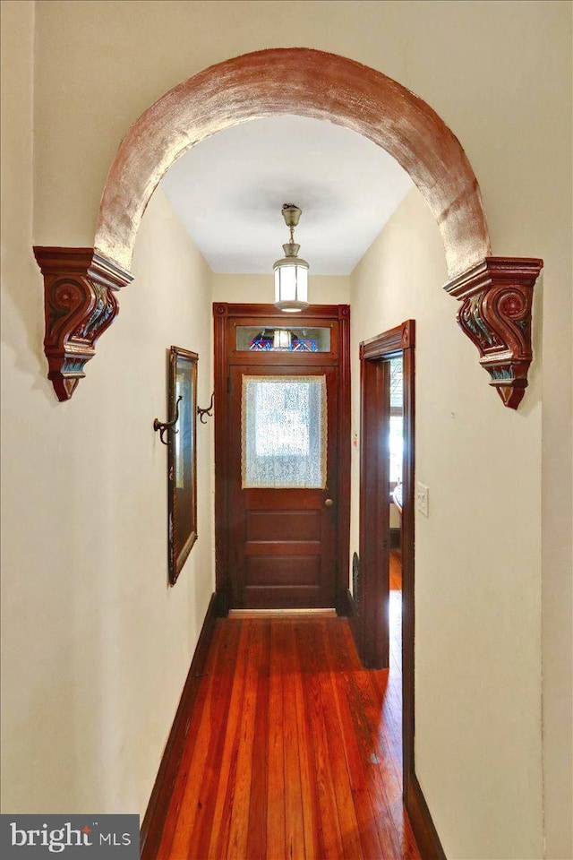 315 Nevin St, Lancaster, PA 17603 - doorway to outside featuring arched walkways and dark wood-style floors